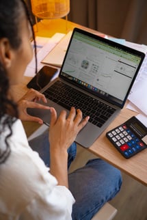 high-angle-woman-working-laptop